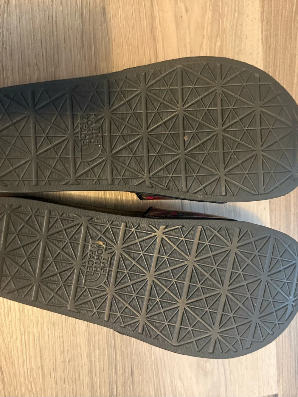 The North Face Slides with colorful Graphic Straps